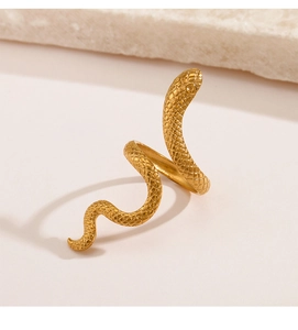Detailed view of gold snake ring with realistic scale texture and adjustable spiral design
