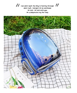 Detail view of the breathable side mesh and metal ventilation holes on the pet backpack