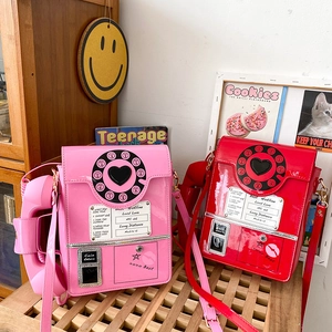Retro vintage telephone shaped shoulder bags in pink and red patent leather with Y2K style