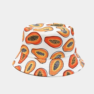 Close-up of durable cotton canvas bucket hat with vibrant tropical papaya patterns