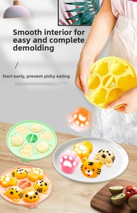 Detail of easy-release silicone mold showing cartoon bear and paw shapes for baby food
