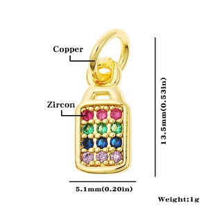 Detail of gold rectangular copper pendant with zircon inlay and product dimensions