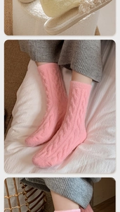 Detailed macro view of pink cable-knit thermal crew socks with soft velvet plush texture
