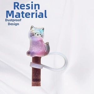 Close-up of glittery resin cat straw cover with silicone dustproof ring attachment