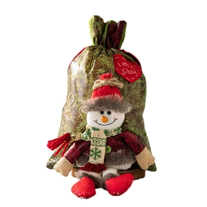 Sac cadeau de Noël avec bonhomme de neige en peluche et fermeture par cordon