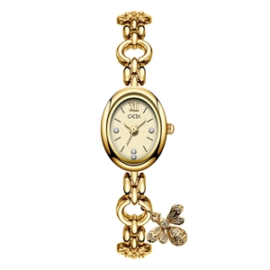 Elegant gold oval quartz watch for women with a unique bee pendant and chain strap
