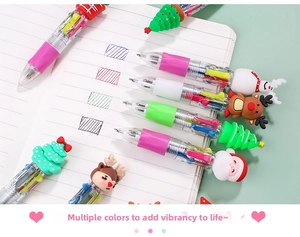 Close-up of Christmas 10-color retractable ballpoint pens with cartoon deer and Santa toppers