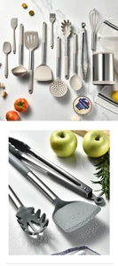 Detail of beige and grey silicone kitchen utensils with stainless steel handles