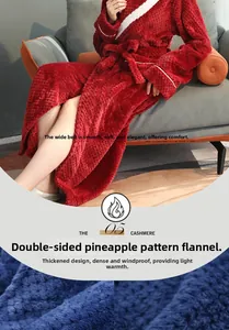 Detailed texture of thick red pineapple grid flannel robe with windproof cuffs