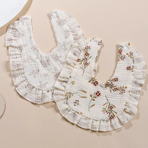 Baby cotton muslin bibs with floral prints and ruffle edges set of two