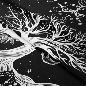 Detailed close-up showing fabric texture and Tree of Life print on the wall tapestry