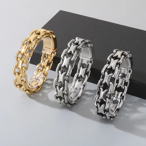 Mens stainless steel X-link bracelet set in gold and silver finish with hollow design