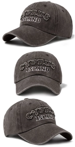 Detail view of CYPRUS ISLAND embroidery and washed cotton texture on baseball cap