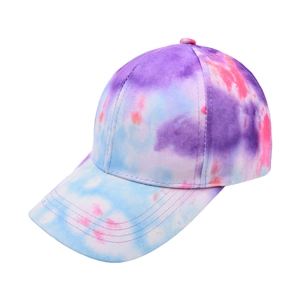 Detailed side view of tie-dye baseball cap in purple, pink and blue dreamy patterns