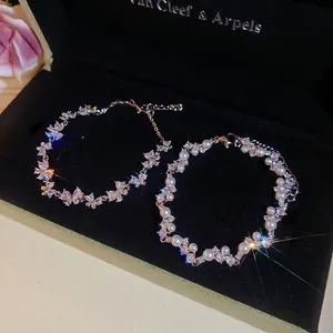 Sparkling butterfly zircon and pearl charm bracelets with adjustable chain on black box