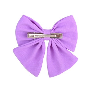 Back view of a large purple satin bow hair clip with a sturdy metal duckbill attachment