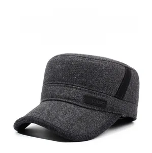 Detail of dark grey wool blend cadet cap with sport label and warm winter texture