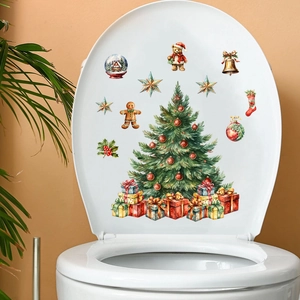 Festive Christmas tree and gift box wall stickers applied on a white toilet lid surface