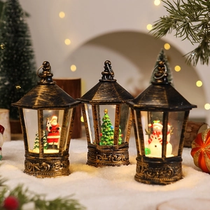 Vintage bronze Christmas postbox lantern with Santa and snowman scenes and warm LED glow