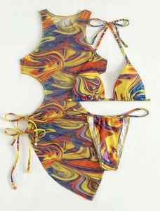 Detail view of a 3-piece bikini set with vibrant marble print and mesh cover-up