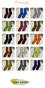 Detailed grid view of 15 colorful ribbed knit wool socks in various pastel and earth tones