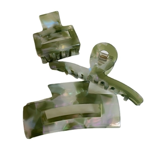 Three pieces of green marble texture acetate hair claws for women in different shapes