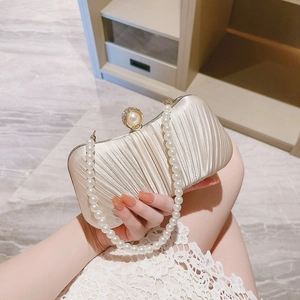 Champagne satin pleated evening clutch with pearl chain and diamond pearl buckle decoration