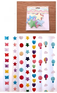 Colorful paper garlands in star and heart shapes for party decorations, eco-friendly material