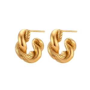 Golden twisted hoop earrings in minimalist stainless steel with polished finish