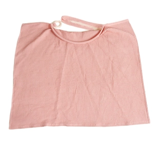 Pink cotton waffle nursing cover with adjustable neck strap for breastfeeding privacy