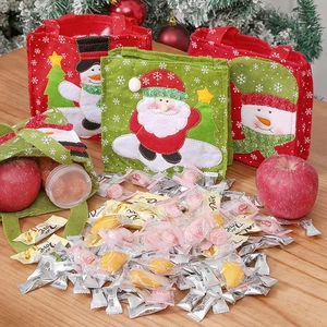 Christmas felt gift bags with Santa and snowman embroidery for holiday celebrations