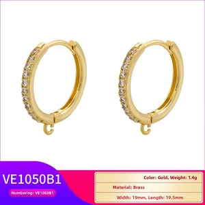 Detailed view of gold brass earrings with cubic zirconia inlay and small DIY hanging loop