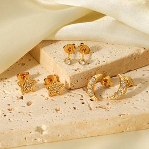 Gold stainless steel star and moon stud earring set with sparkling zircon stones