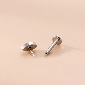 16G stainless steel push-in labret stud with cubic zirconia in a silver-tone finish