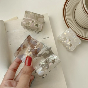 Chic resin star shark hair clips in tortoiseshell and iridescent finishes for women