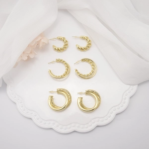 18K Gold Plated Copper Twisted C-Shaped Hoop Earrings For Women Fashion Light Luxury Geometric Spiral Earrings Jewelry