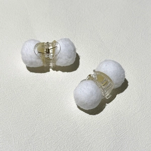 Cute white plush ball hair clips set in transparent plastic for women's winter styling