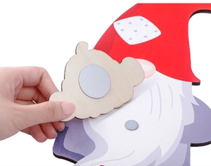 Detail of magnetic Christmas gnome wooden door sign with interchangeable cloud accessory