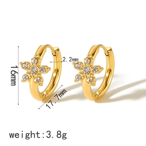Macro view of gold flower earrings with crystals showing 16mm and 17.7mm size dimensions