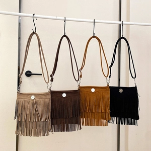 French vintage tassel crossbody bags in khaki brown and black suede with metal buckles