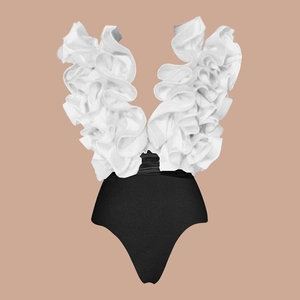 Detail of white ruffle trim and deep V-neckline on black high-waisted swimsuit