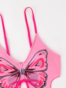 Close-up of pink bikini top with large butterfly print and adjustable spaghetti straps