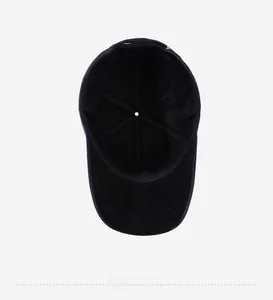 Detail view of the black baseball cap's internal six-panel structure and reinforced seams