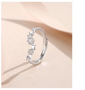 Macro side view of silver star zircon adjustable open ring with sparkling crystal inlay