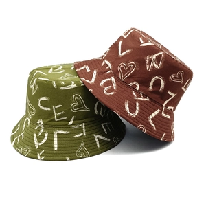 Olive and brown cotton bucket hats with white graffiti heart and letter prints