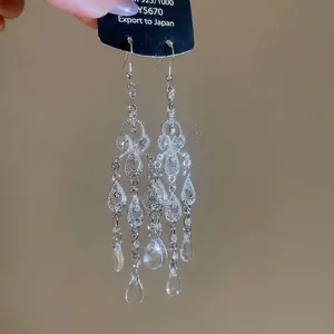 Luxurious S925 silver hollow teardrop earrings with sparkling crystal accents