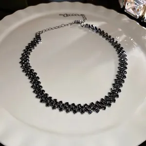 Elegant double-row black crystal choker necklace with silver-tone extension chain