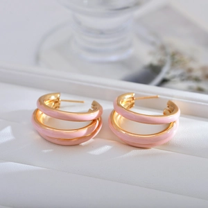 Chic triple-layered pink enamel hoop earrings with elegant gold metal finish