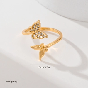Detail shot of a gold butterfly ring with zircon accents, sizing 1.7cm and 2g weight