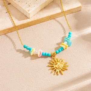 Gold stainless steel sun pendant necklace with colorful irregular stone beads on stone base